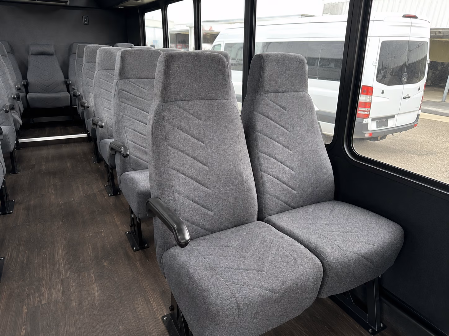 long distance charter buses from kalamazoo to detroit stadiums